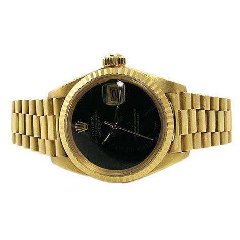 womens gold rolex black face|Official Rolex Website.